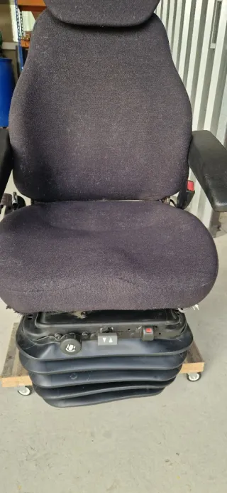 Asiento neumático para excavadora