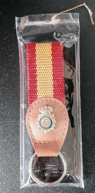 Set Policía Nac.: Llavero, Bolí, Pin Pulsera Polié