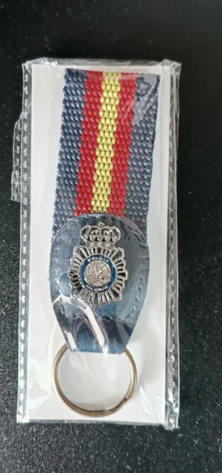 Set Policía Nac.: Llavero, Bolí, Pin Pulsera Polié