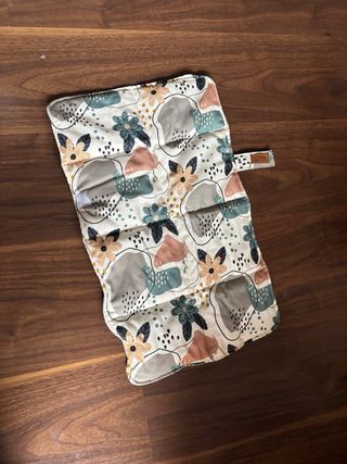 Mochila, cambiador y saco a juego