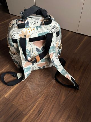 Mochila, cambiador y saco a juego