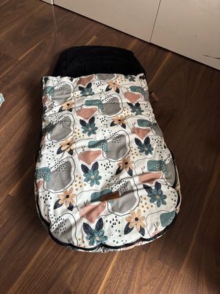 Mochila, cambiador y saco a juego