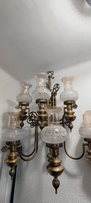 Lámpara de pared dorada y transparente de aplique