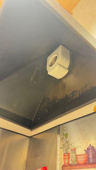 Campana de cocina rústica de hierro fundido