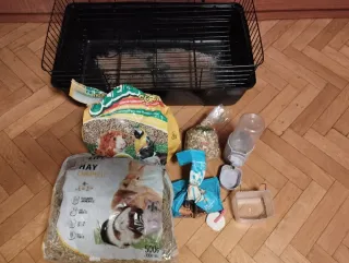 Jaula conejo, comida, heno, bebedero, cama..