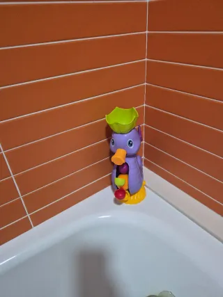 Juguete de baño pato morado con vasos