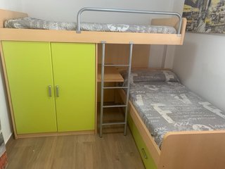 Litera y cama nido de madera y metal