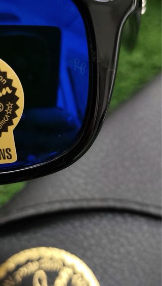 Gafas de sol Ray-Ban negras y azules