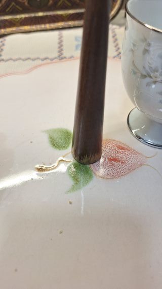 Fuente de porcelana con asa