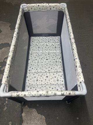 Cuna de viaje estrellas