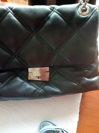 Bolsos negro usado  y beige sin usar con etiqueta