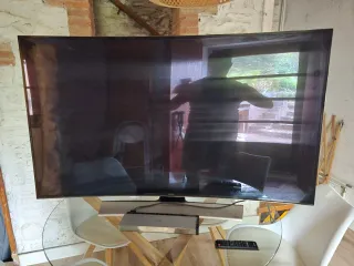 TV Samsung 65 Curva Negra y Plateada