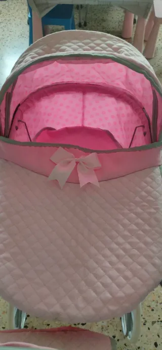 Carrito de bebé de juguete rosa. NEGOCIABLE
