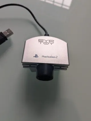 PS2 Slim Negra + Mandos + juegos + micros + eyetoy