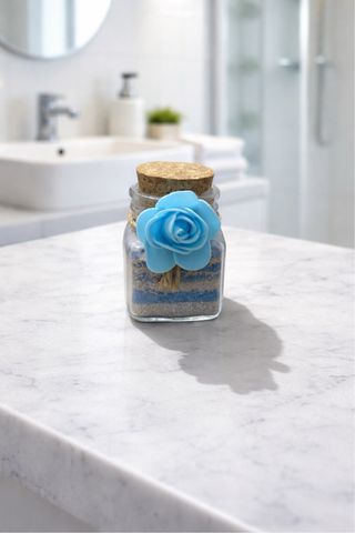 Adorno de cristal con flor azul