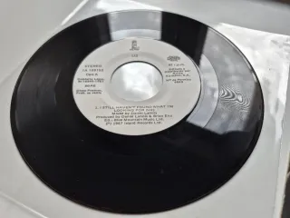 U2 raro single 7" promo Still Haven't Found vinilo