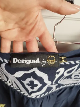 Falda Desigual bordada azul y dorada