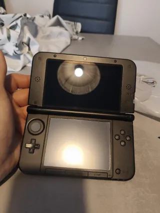 Nintendo 3DS XL + juegos + palito + cargador