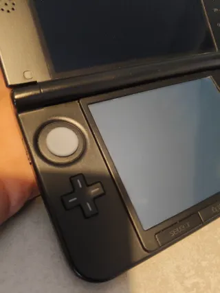 Nintendo 3DS XL + juegos + palito + cargador