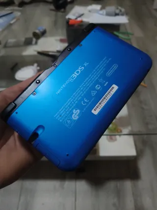 Nintendo 3DS XL + juegos + palito + cargador