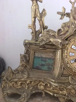 Reloj de mesa antiguo de mármol y metal