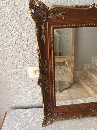 Mueble de entrada con espejo y mármol