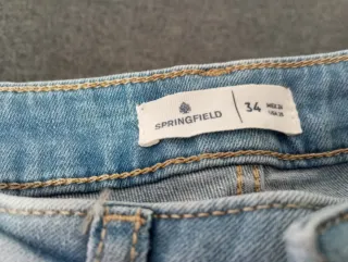 Pantalones vaqueros grises y azules