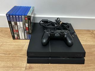 PS4 con mando y 8 juegos