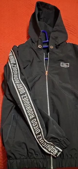 Giubbino uomo nero con logo