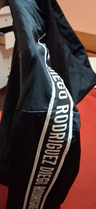 Giubbino uomo nero con logo