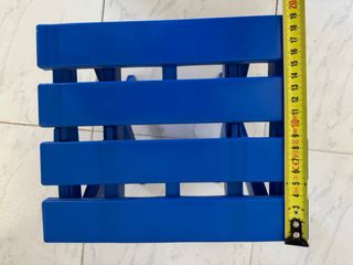 Taburete plegable azul para camping