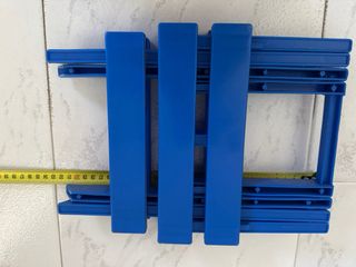 Taburete plegable azul para camping