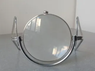 Antigua lupa plegable con estuche