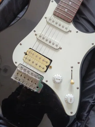 Guitarra eléctrica con amplificador