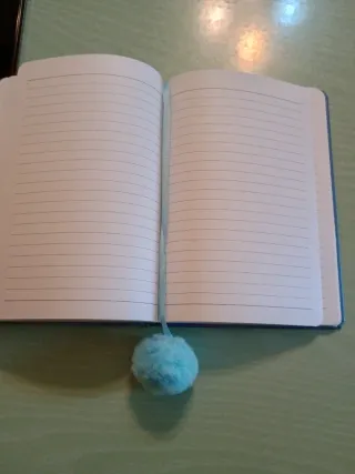 Diario Stitch con pompon blu