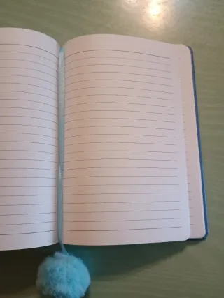 Diario Stitch con pompon blu
