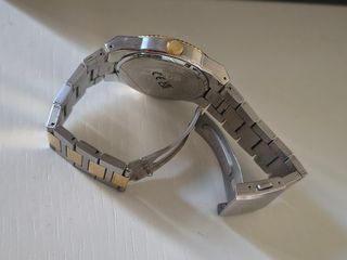 Reloj Lotus bicolor dorado y plateado