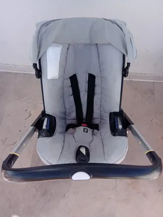 Silla de coche y carrito Doona