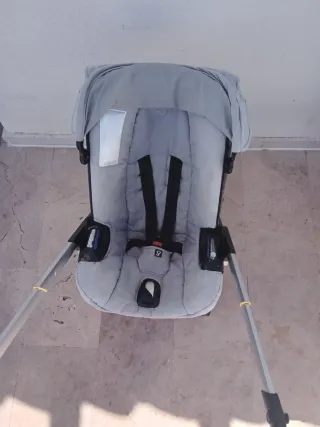 Silla de coche y carrito Doona