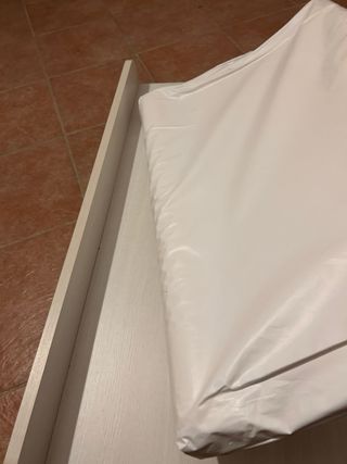 Cambiador de bebé con tabla