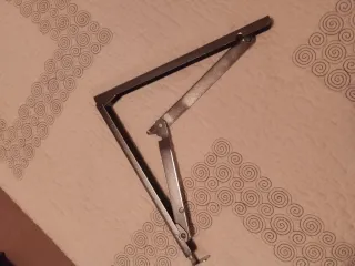 Escuadras abatibles metálicas
