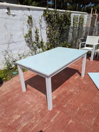 Mesa extensible exterior con 6 sillas