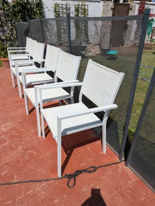 Mesa extensible exterior con 6 sillas