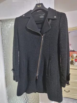 Cappotto nero Motivi