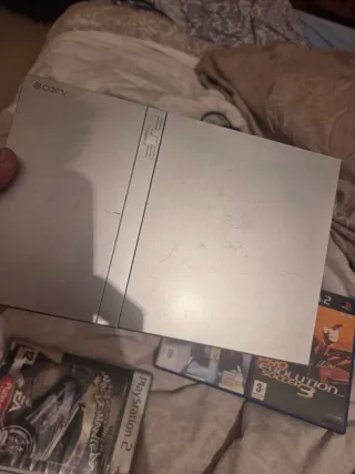 Ps2 slim Plata + 7 Juegos