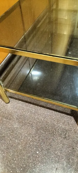 Mesa de centro cristal y metal dorado
