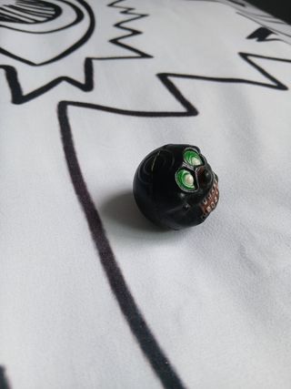 Figura cara monstruo juguete retro