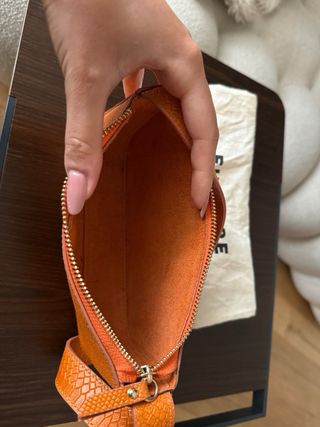 Borsa Euterpe pelle arancione effetto pitone