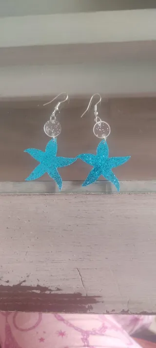 Pendientes estrella azul y blanco sin estrenar