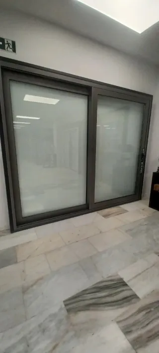 Puerta corredera elevable + fijo
